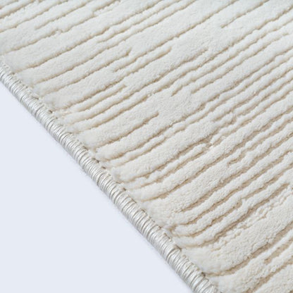 TAPIS SIGNO CREME  148