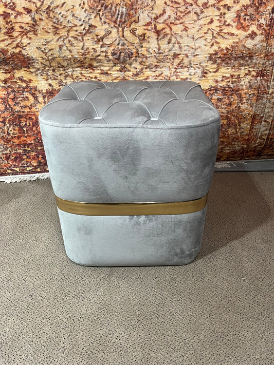 Pouf capitonnée