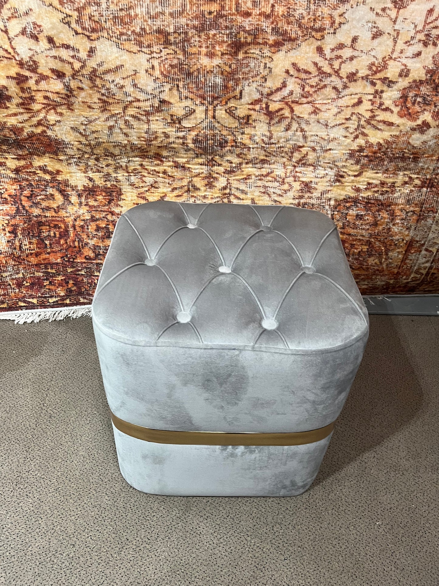 Pouf capitonnée