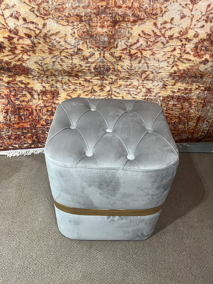 Pouf capitonnée