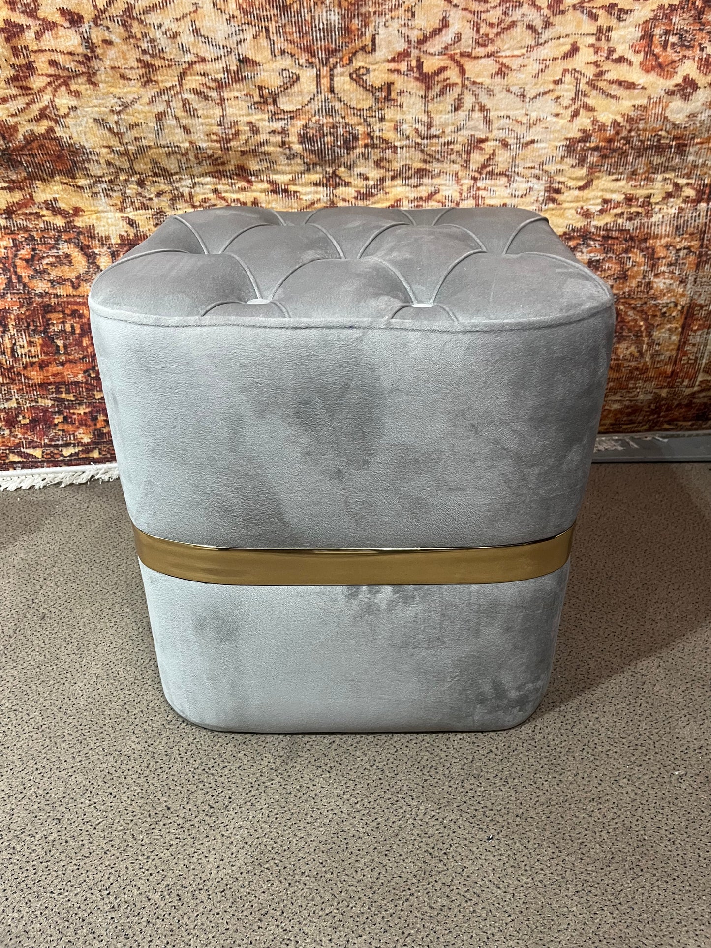 Pouf capitonnée