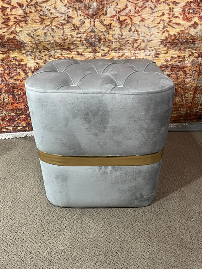Pouf capitonnée